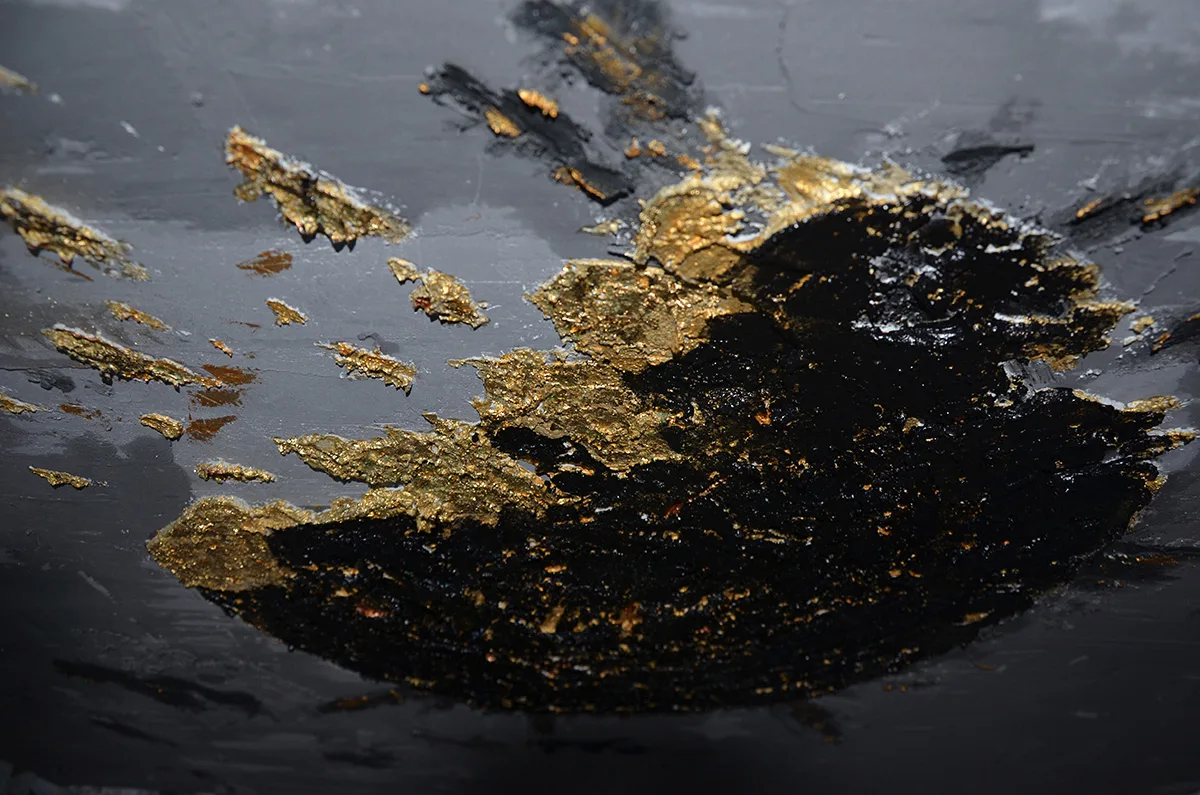 details of Benie's abstract painting Last seconds black paint with gold leaves